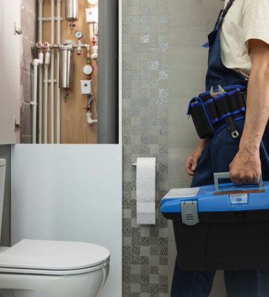 man in overalls holds a toolbox while standing in a bathroom, ready to perform maintenance work.